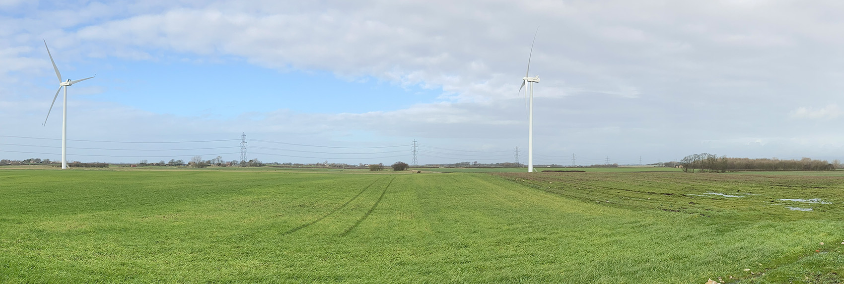 North woods Farm solar site showing existing wind turbines